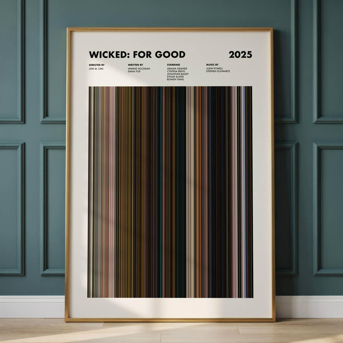 Wicked: For Good Movie Barcode Poster framed and leaning against a panelled wall