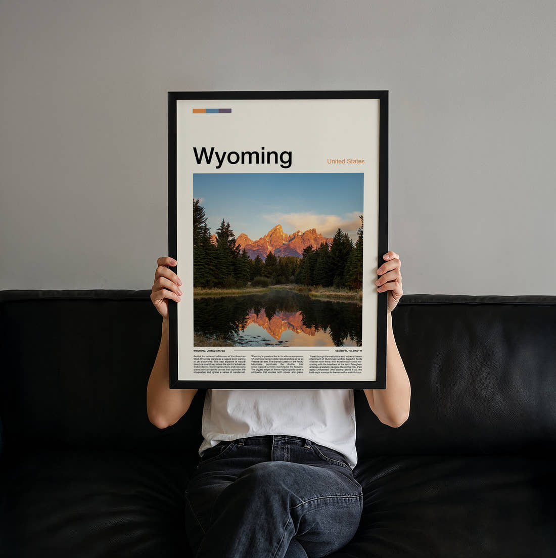 Wyoming Mountains Reflected At Dawn Travel Print held up by hand to show the size of the print