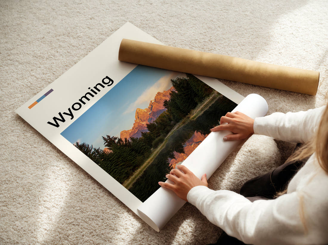 Wyoming Mountains Reflected At Dawn Travel Print being unrolled from its postal tube