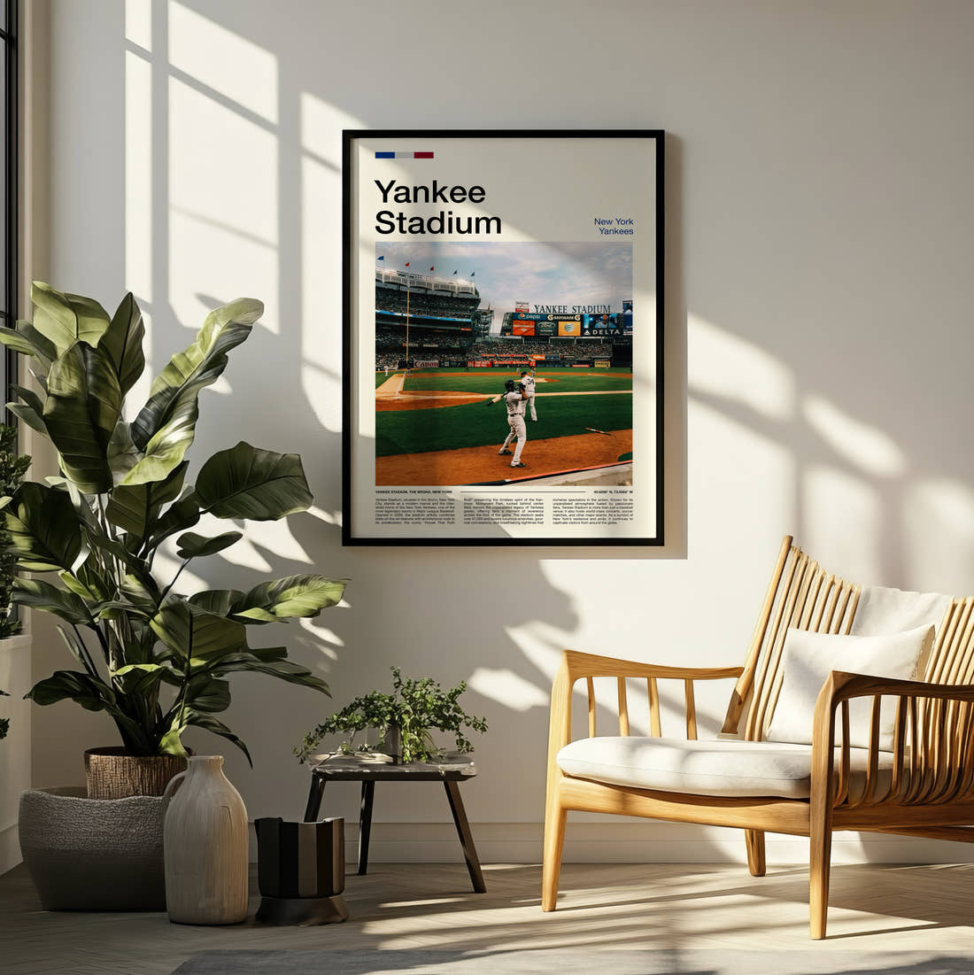 Yankee Stadium Print framed on a pale wall beside houseplants
