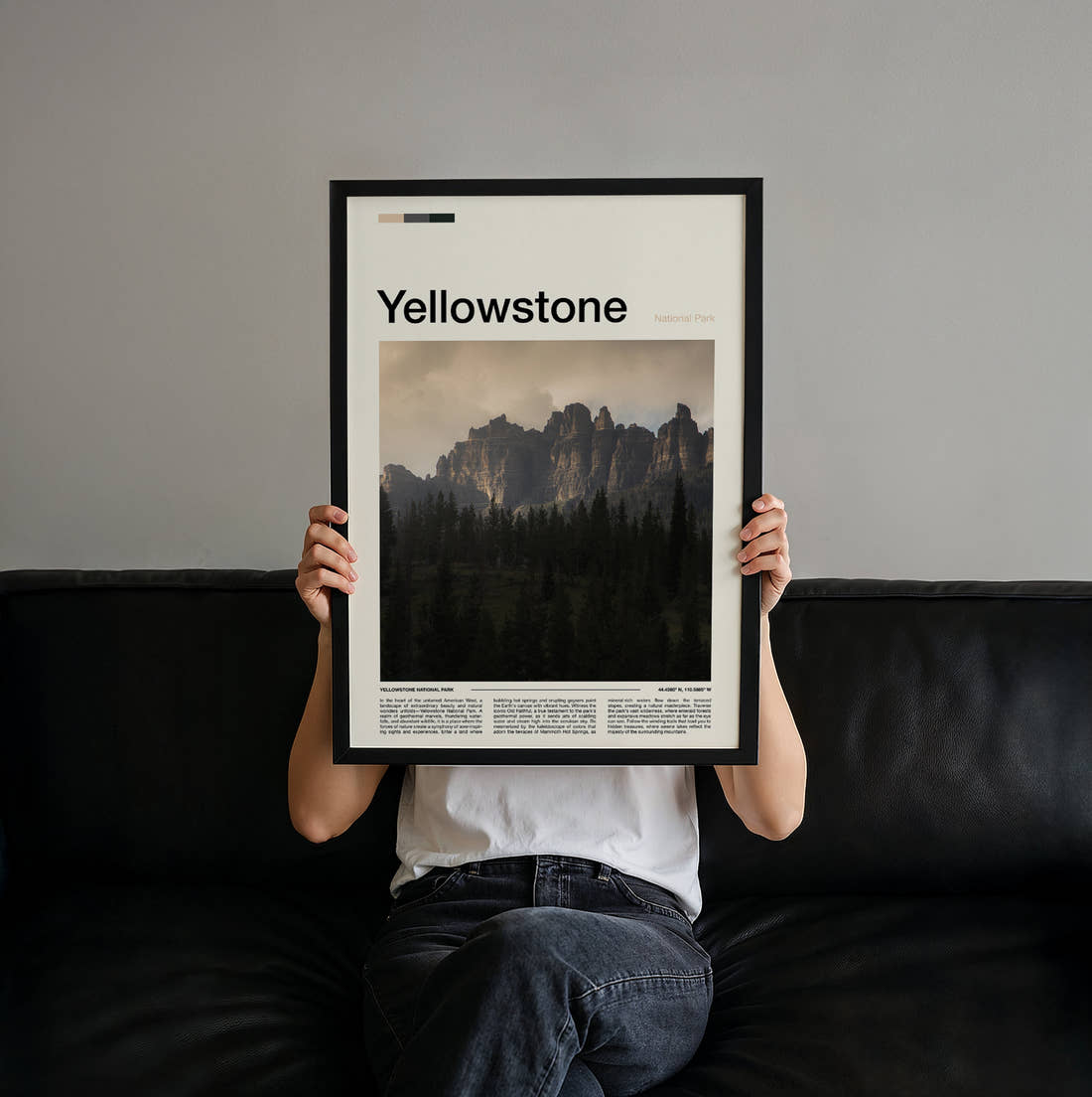 Yellowstone Rocky Spires Above Forest Travel Print held up by hand to show the size of the print