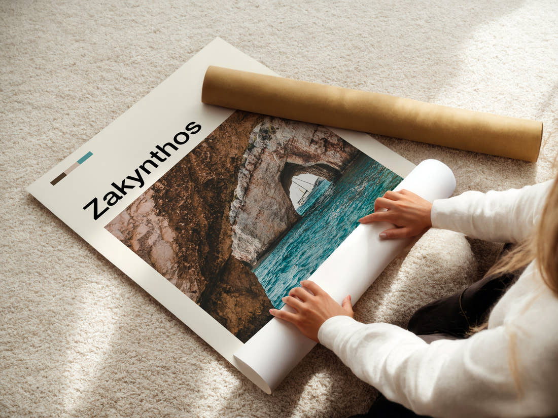 Zakynthos Sea Cave Arch Travel Print being unrolled from its postal tube
