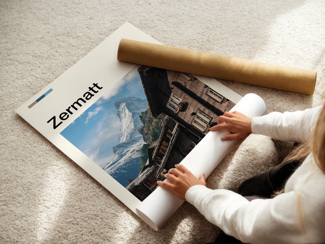 Zermatt Wooden Chalet And Matterhorn Travel Print being unrolled from its postal tube