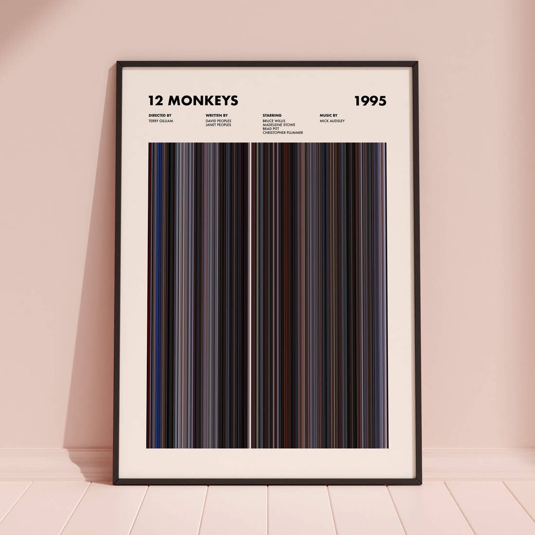 12 Monkeys Movie Barcode Poster framed and leaning against a coloured wall