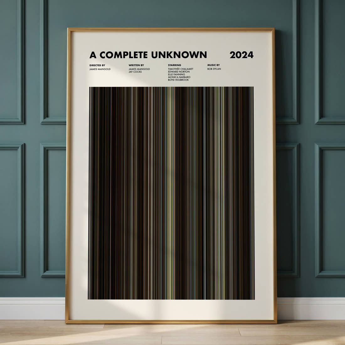 A Complete Unknown Movie Barcode Poster framed and leaning against a panelled wall