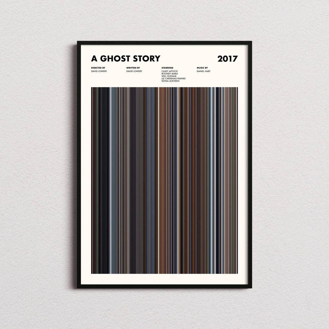 A Ghost Story Movie Barcode Poster framed on a plain studio wall