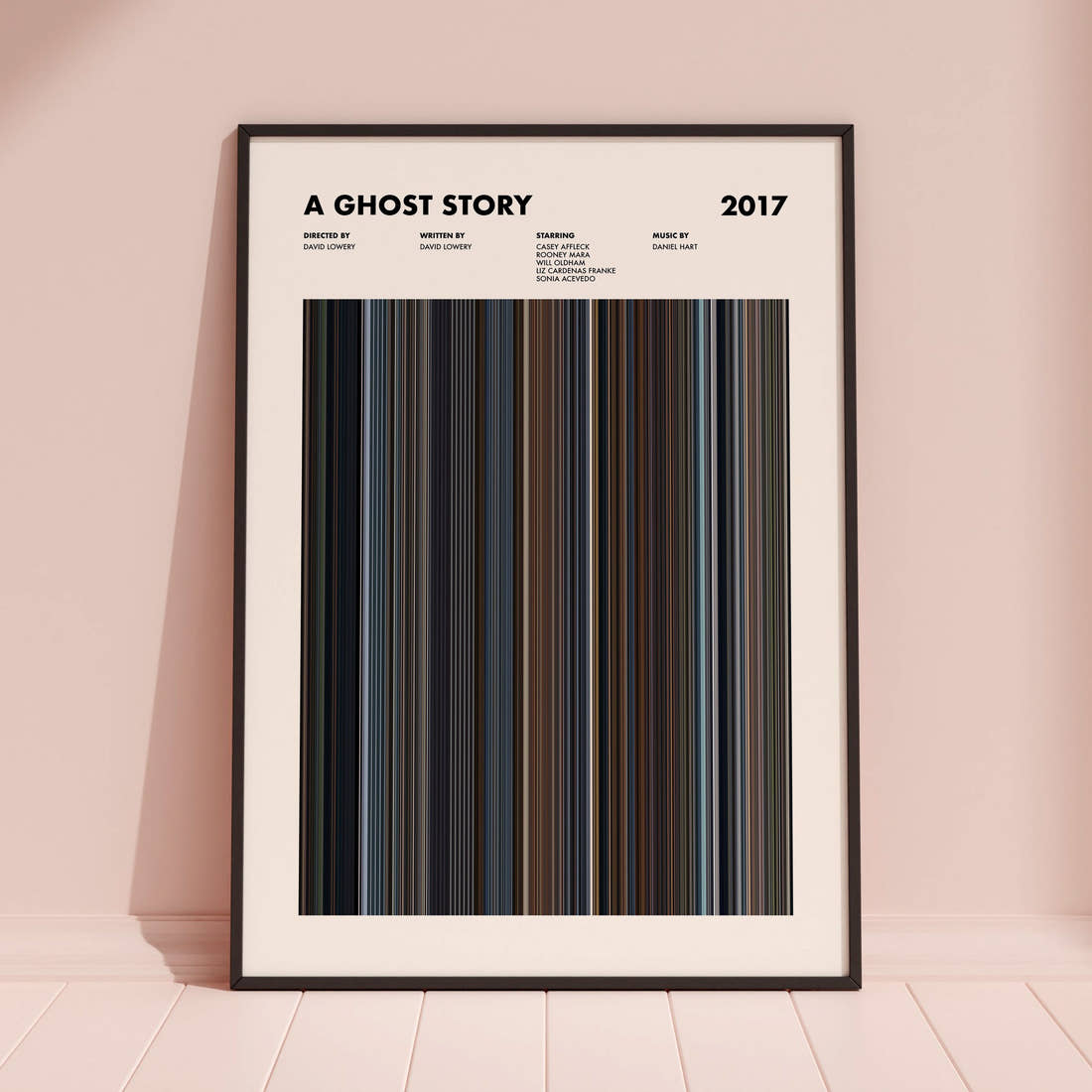 A Ghost Story Movie Barcode Poster framed and leaning against a coloured wall
