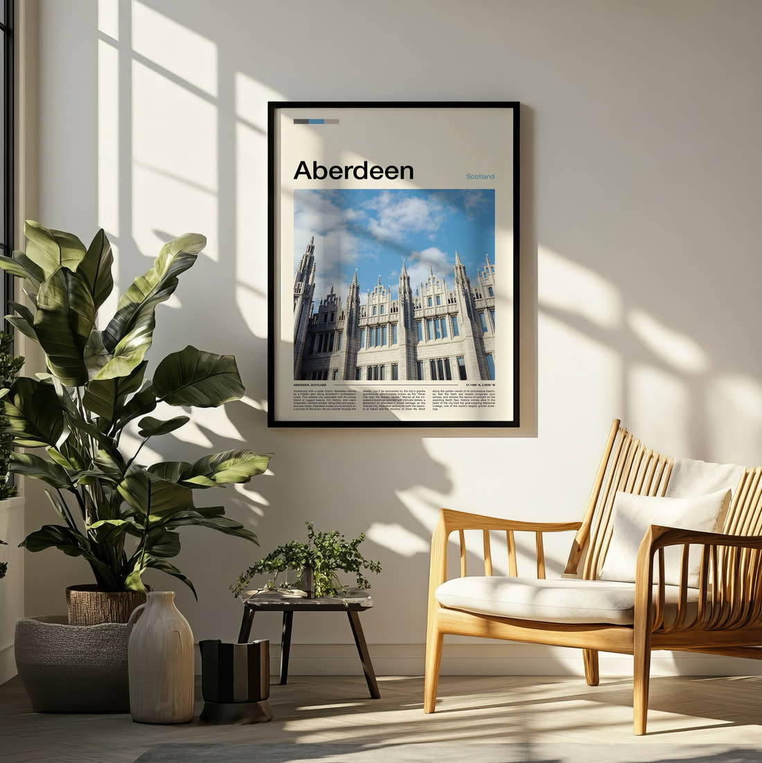 Aberdeen Marischal College Travel Print framed on a pale wall beside houseplants