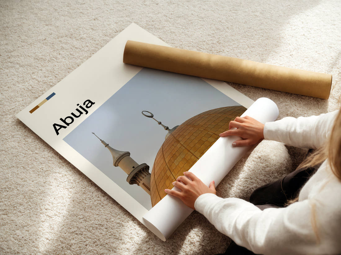 Abuja Golden Dome Travel Print being unrolled from its postal tube