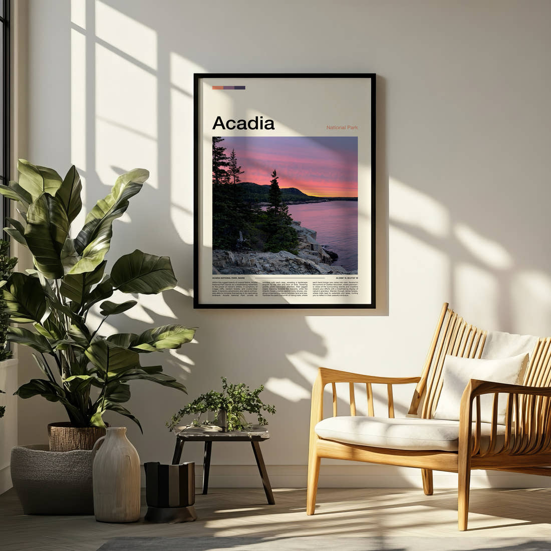 Acadia Coastal Sunset Travel Print framed on a pale wall beside houseplants