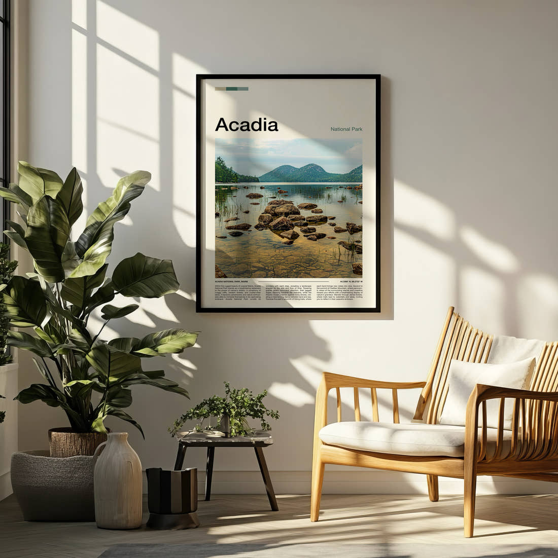 Acadia Jordan Pond Travel Print framed on a pale wall beside houseplants