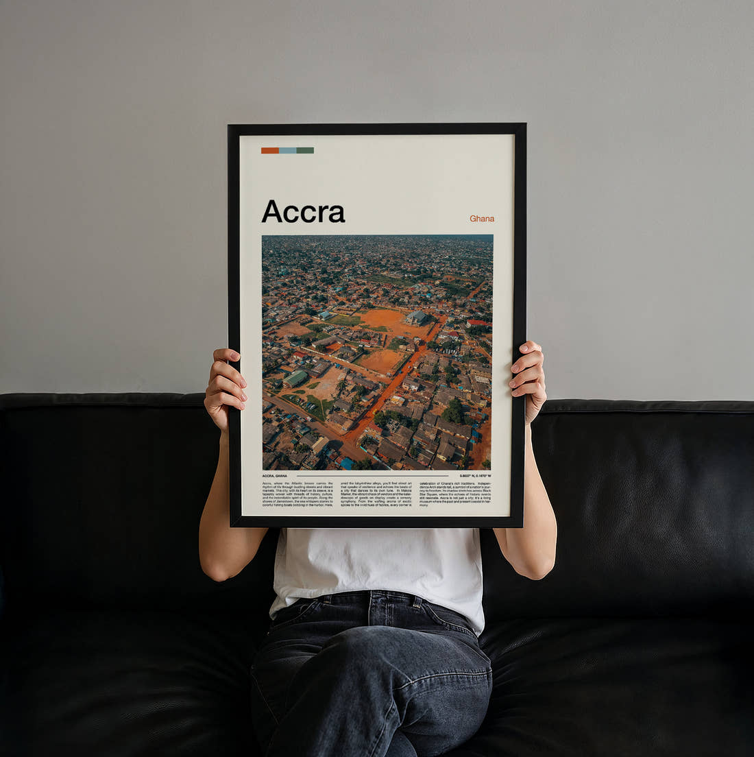 Accra Aerial City View Travel Print held up by hand to show the size of the print