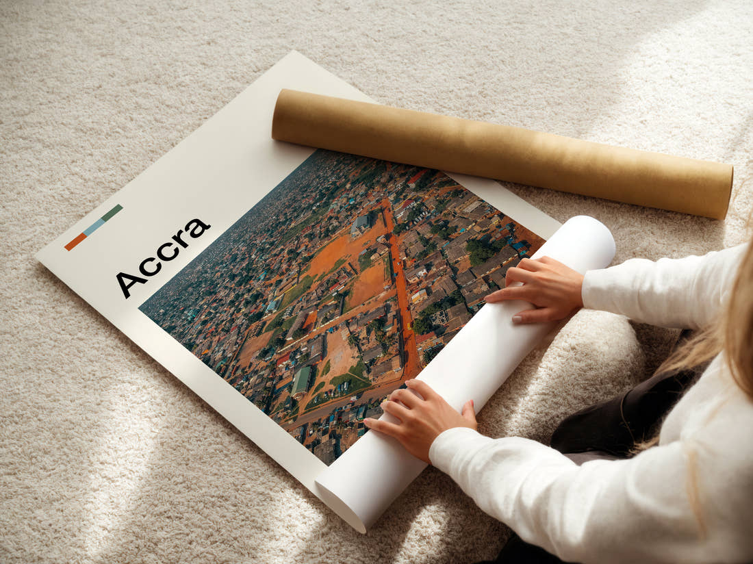 Accra Aerial City View Travel Print being unrolled from its postal tube