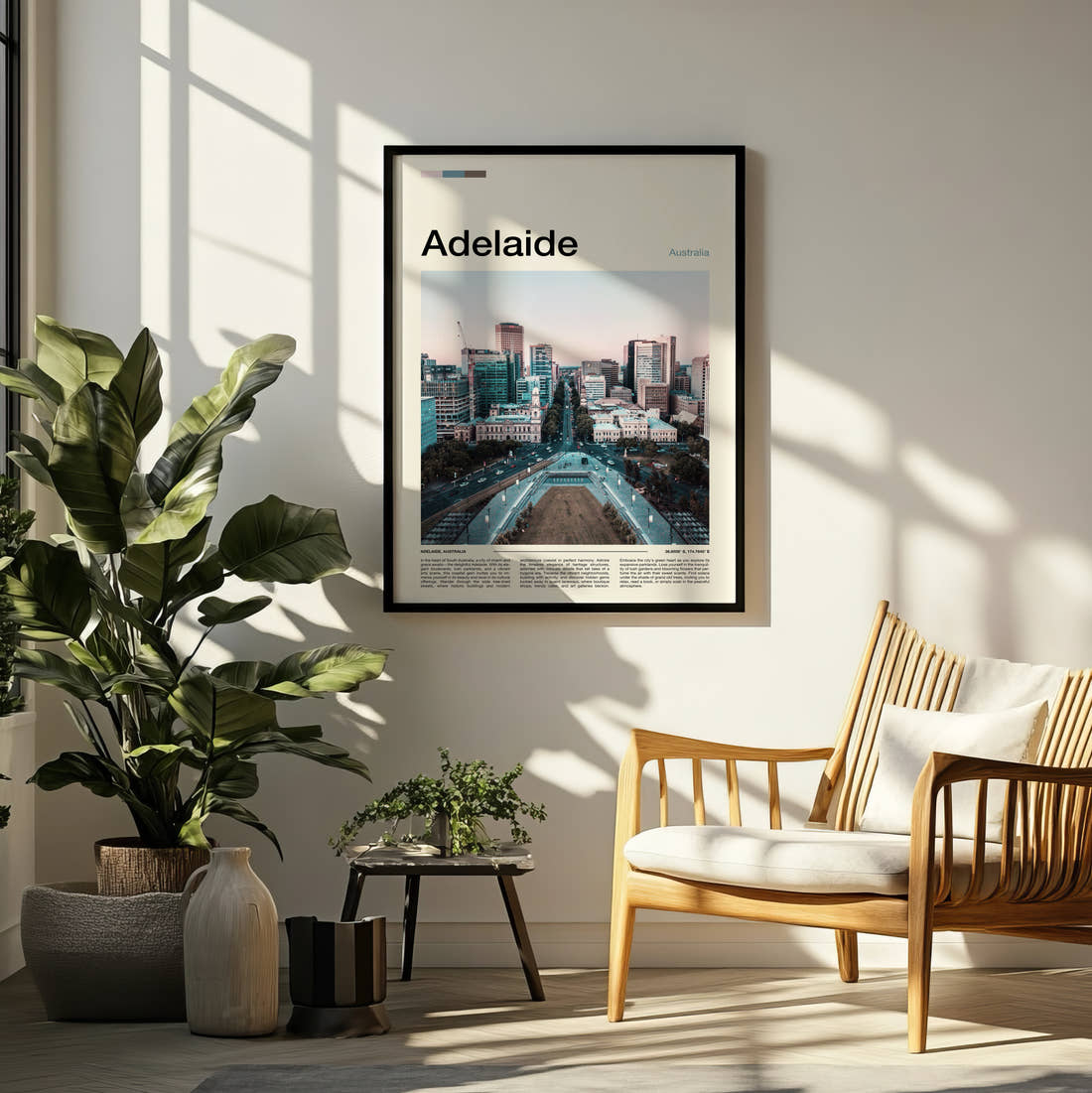 Adelaide Travel Print framed on a pale wall beside houseplants