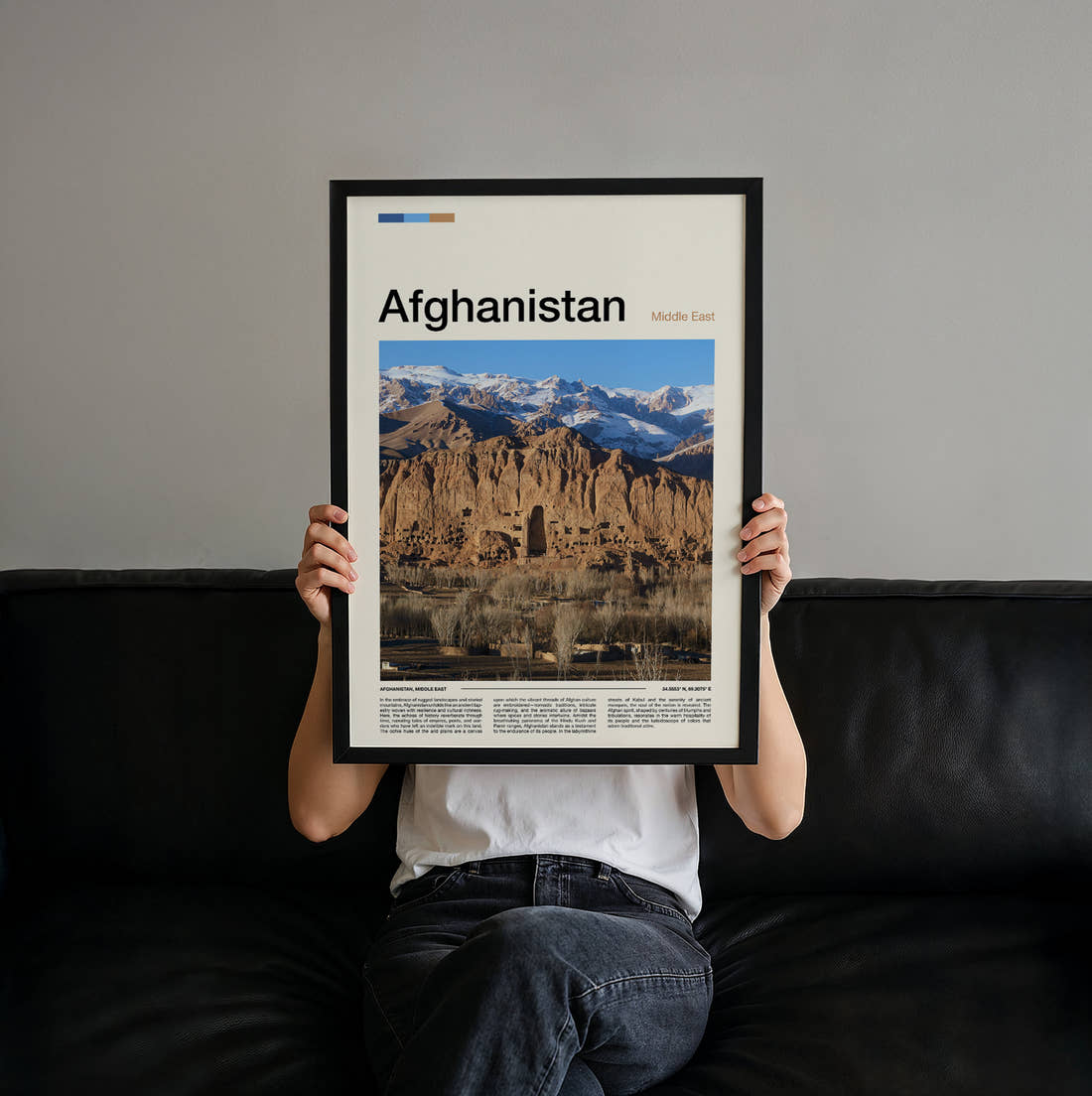 Afghanistan Bamiyan Buddha Cliffs Travel Print held up by hand to show the size of the print