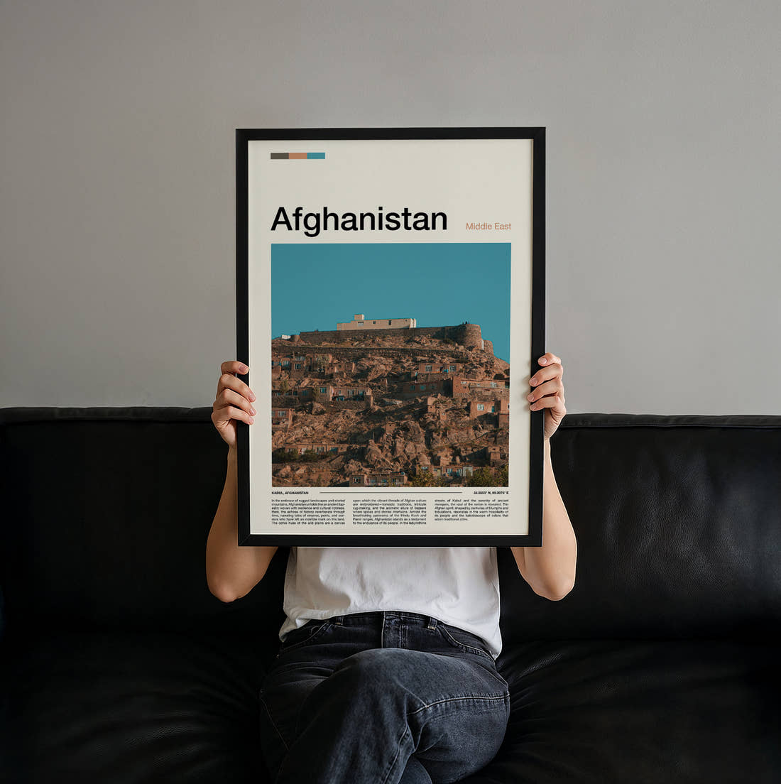 Afghanistan Houses On The Hillside Travel Print held up by hand to show the size of the print
