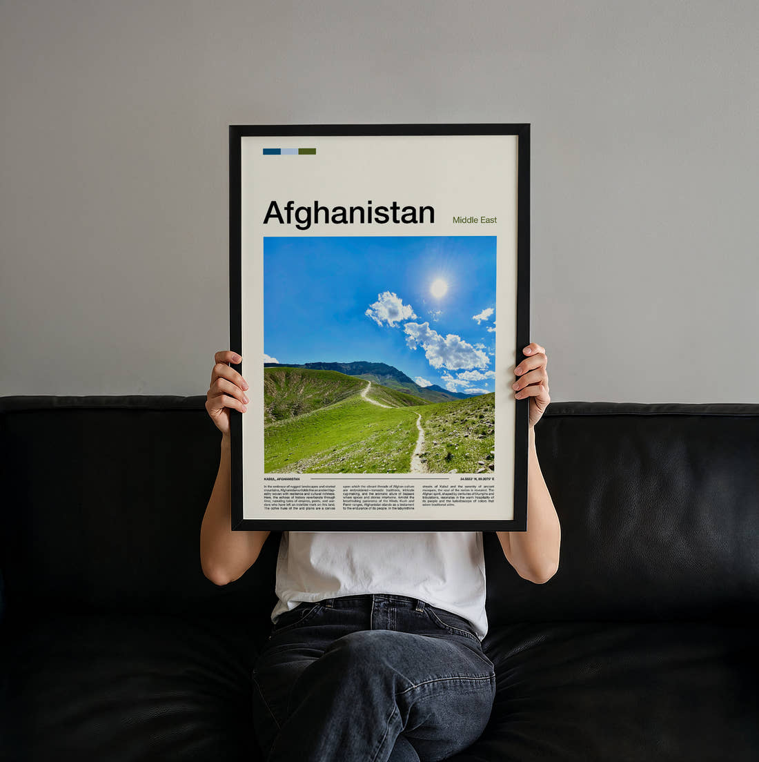 Afghanistan Green Hillside Path Travel Print held up by hand to show the size of the print