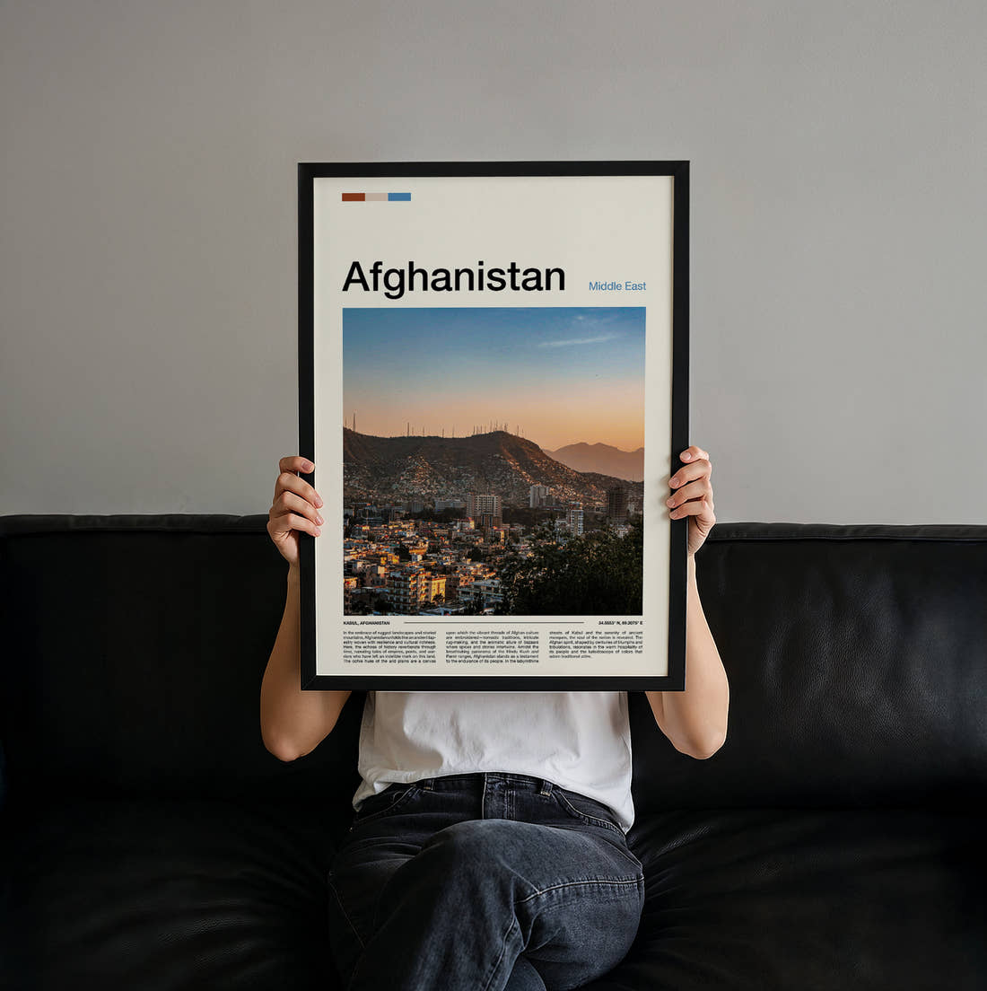 Afghanistan City Below Mountains Travel Print held up by hand to show the size of the print
