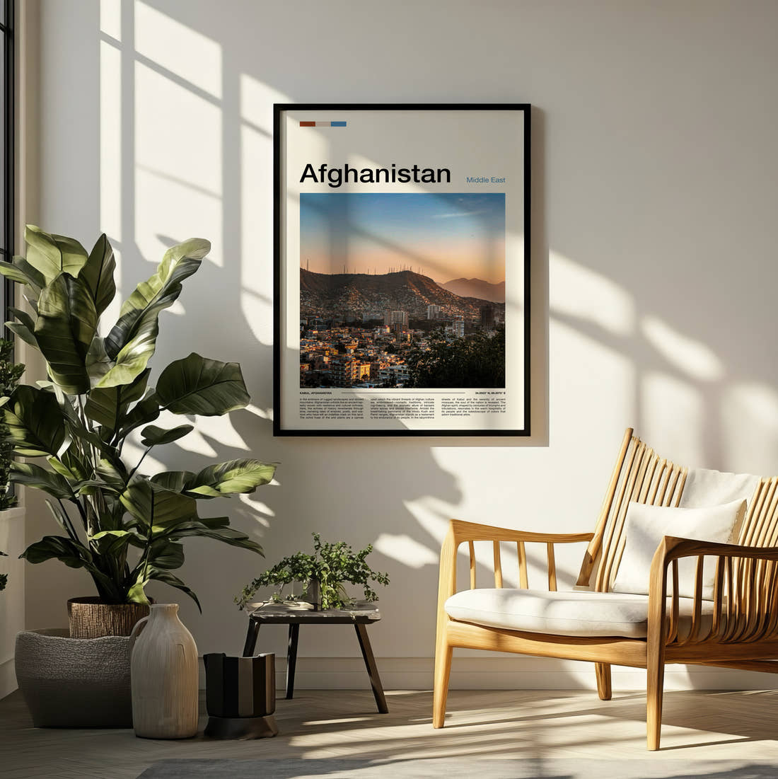 Afghanistan City Below Mountains Travel Print framed on a pale wall beside houseplants