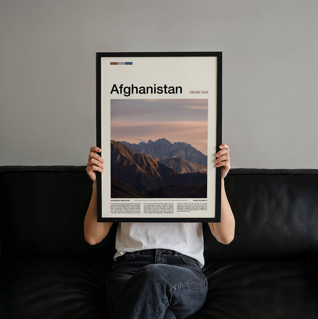 Afghanistan Rugged Mountains Travel Print held up by hand to show the size of the print