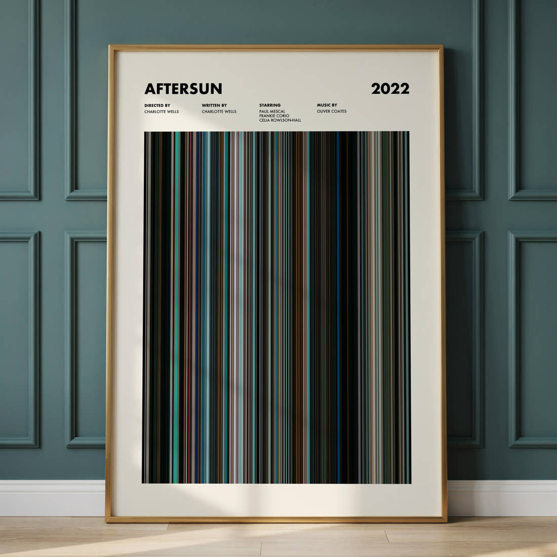 Aftersun Movie Barcode Poster framed and leaning against a panelled wall