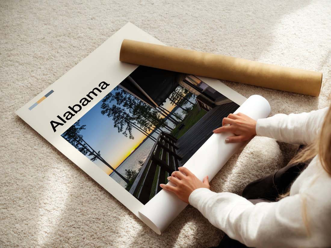 Alabama Lakeside Cabin Deck Travel Print being unrolled from its postal tube