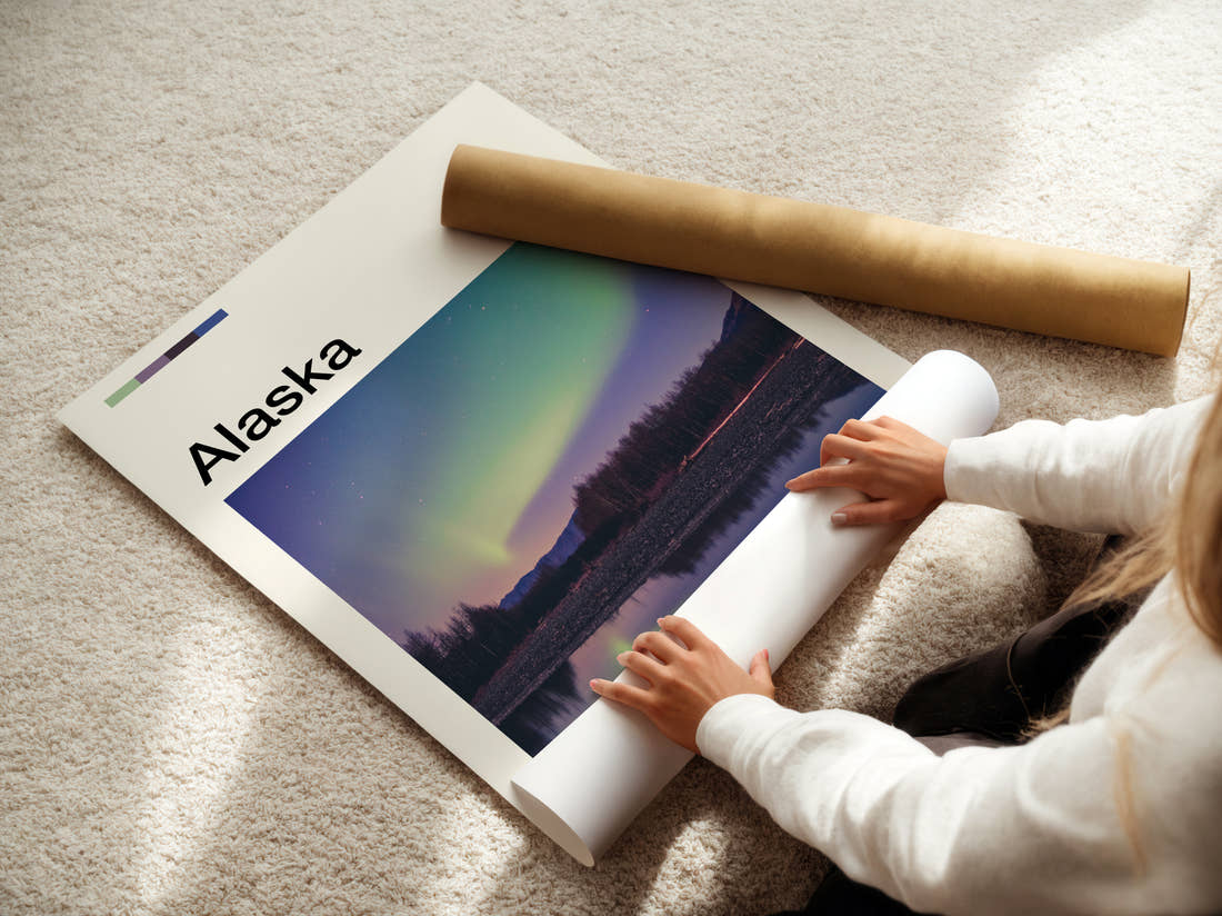 Alaska Northern Lights Travel Print being unrolled from its postal tube