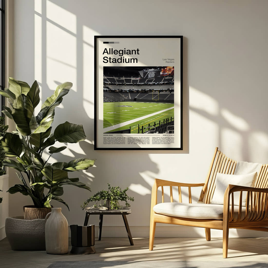 Allegiant Stadium Print framed on a pale wall beside houseplants