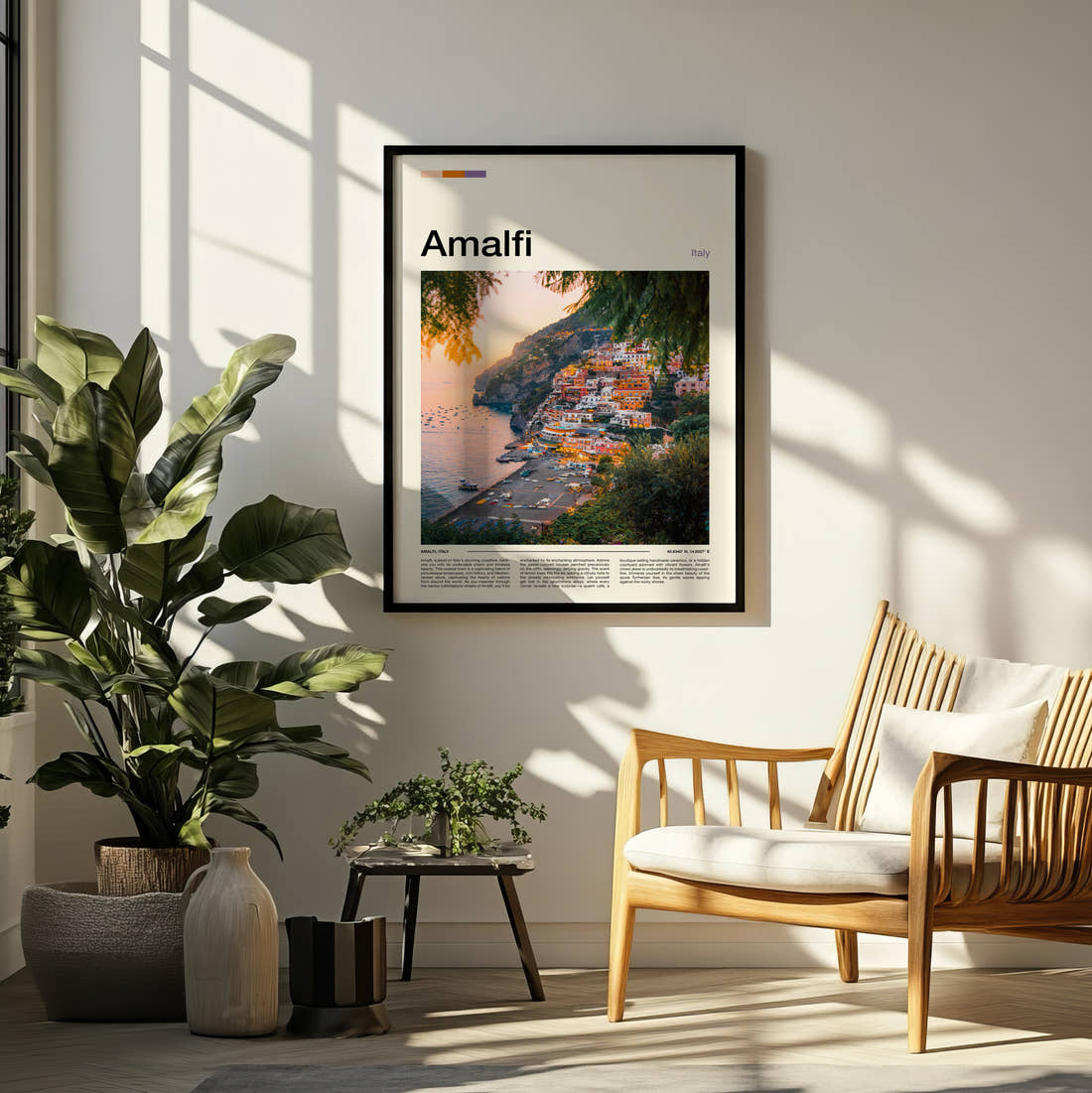 Amalfi Positano At Sunset Travel Print framed on a pale wall beside houseplants