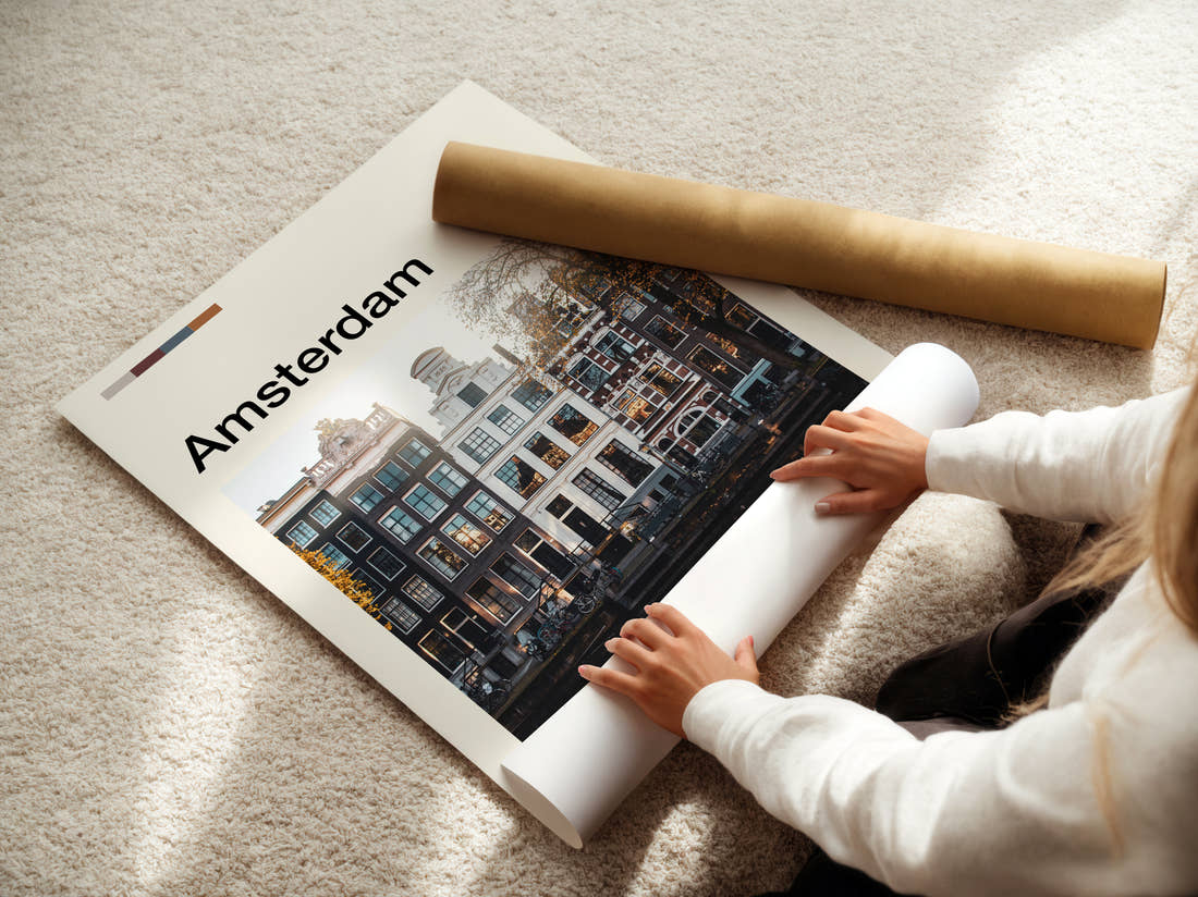 Amsterdam Canal Houses Travel Print being unrolled from its postal tube
