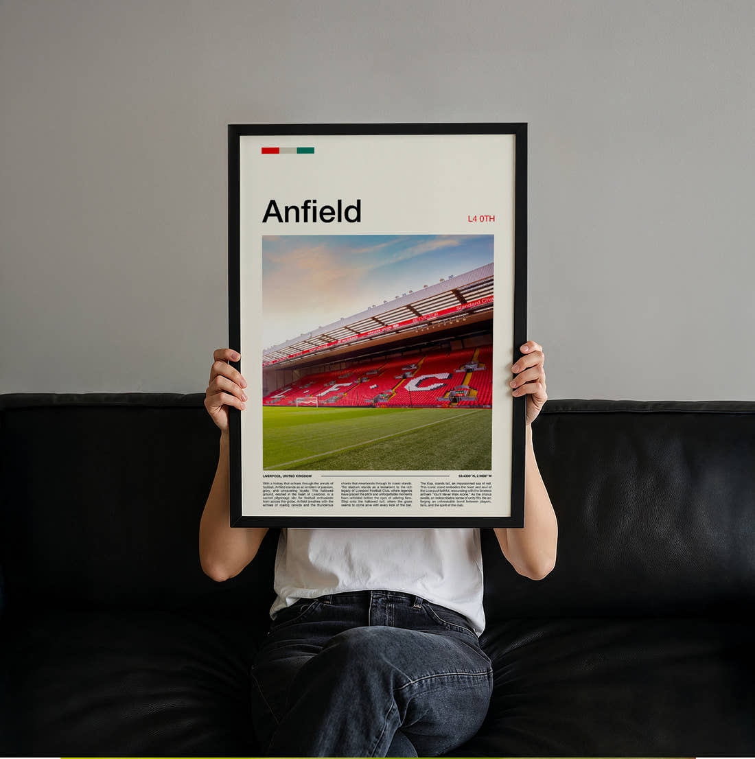 Anfield Stadium Print held up by hand to show the size of the print