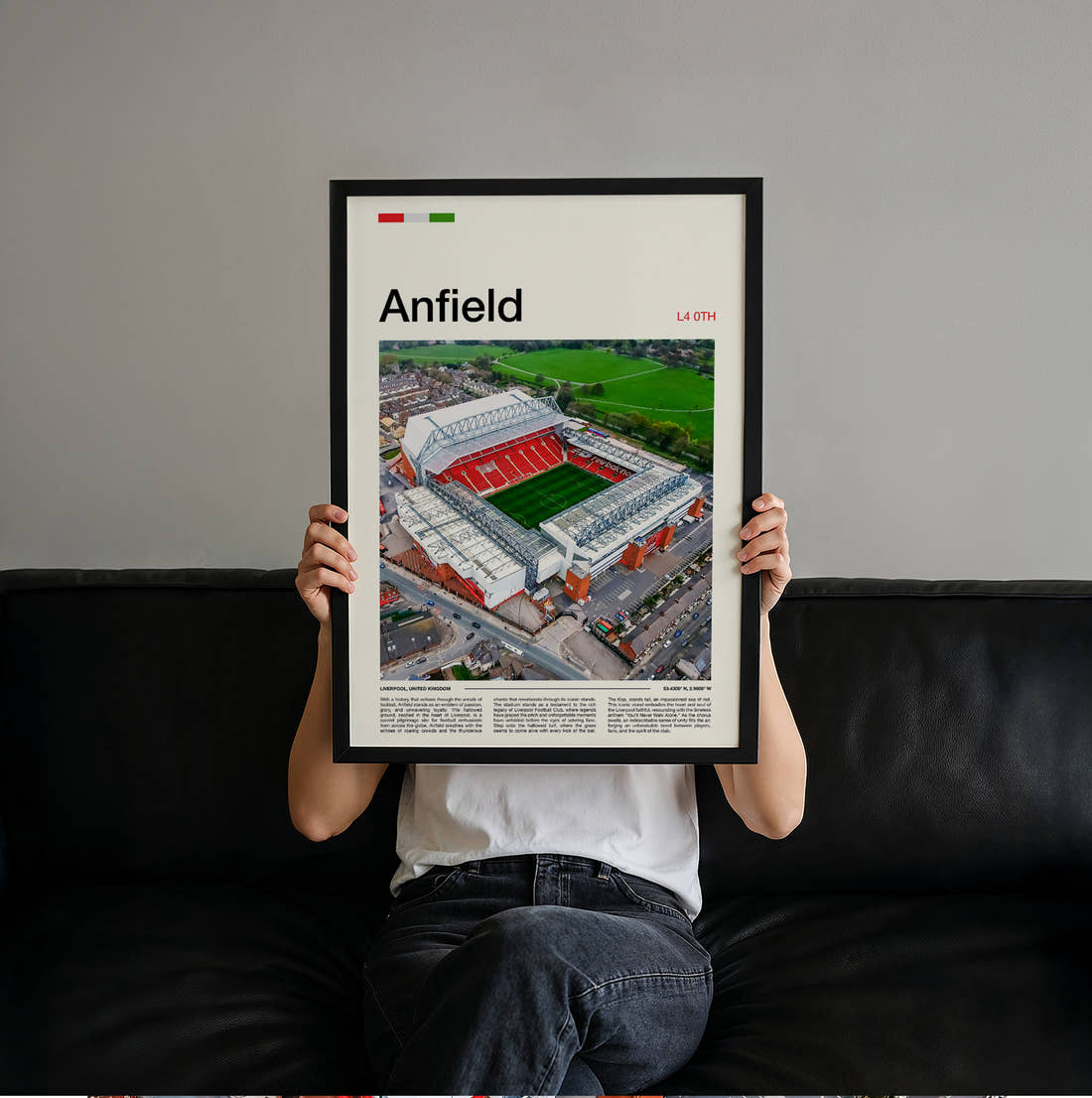 Anfield Stadium Print held up by hand to show the size of the print