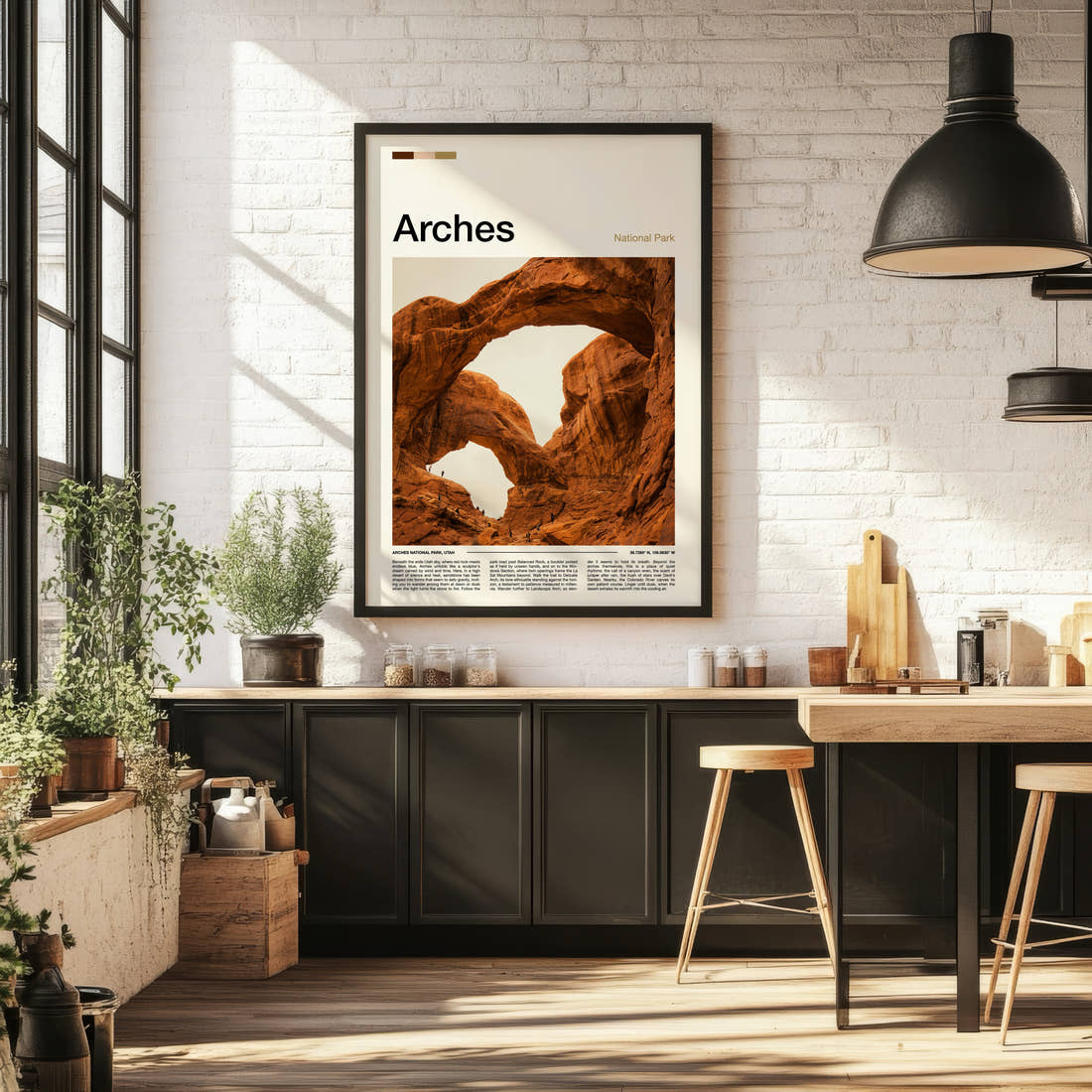 Arches Twin Rock Arches Travel Print framed on the wall of a bright kitchen and dining space