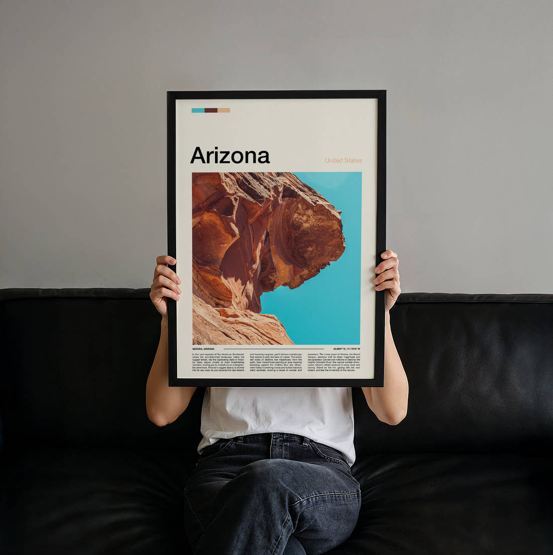 Arizona Red Sandstone Cliff Travel Print held up by hand to show the size of the print