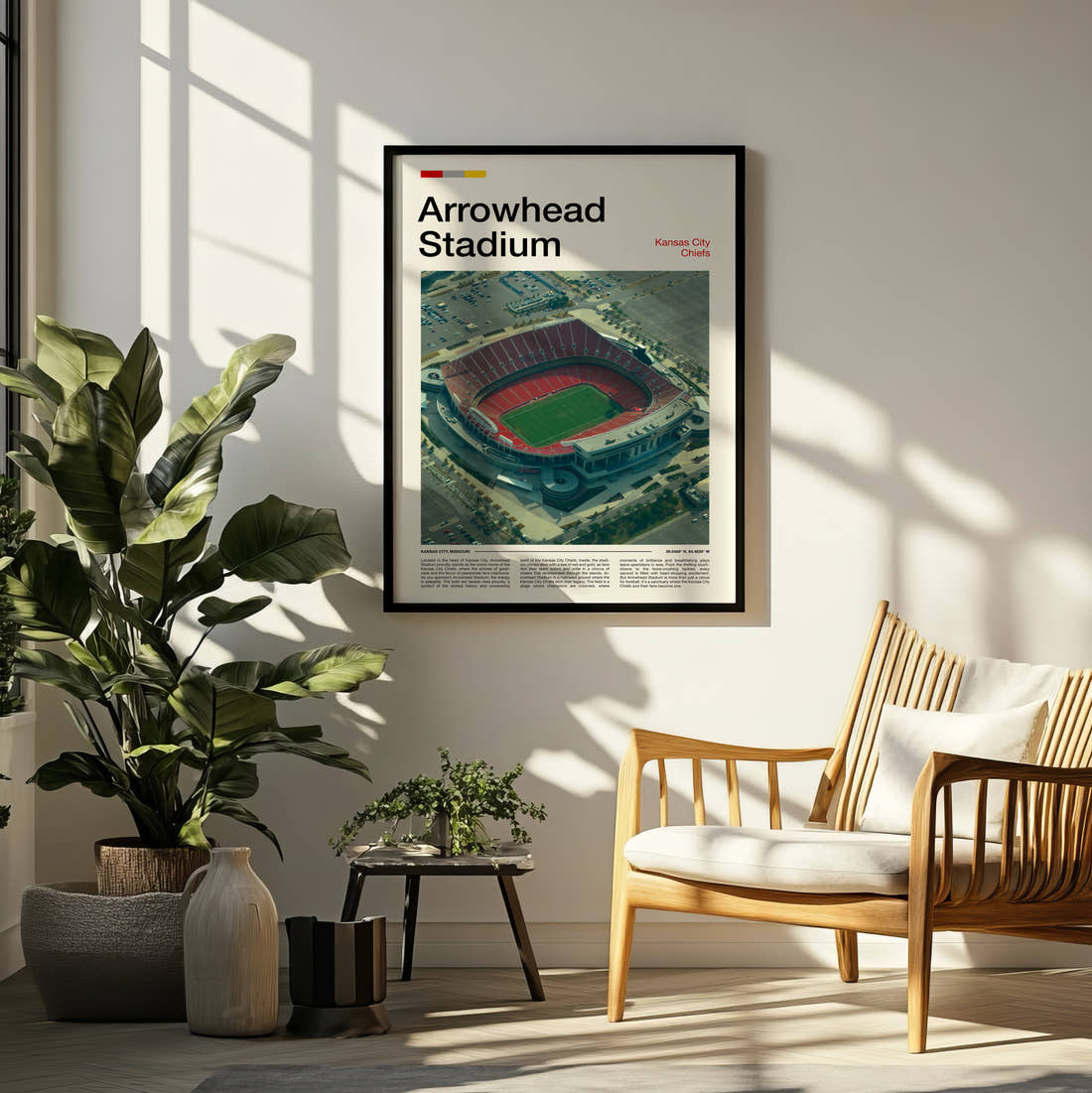 Arrowhead Stadium Print framed on a pale wall beside houseplants