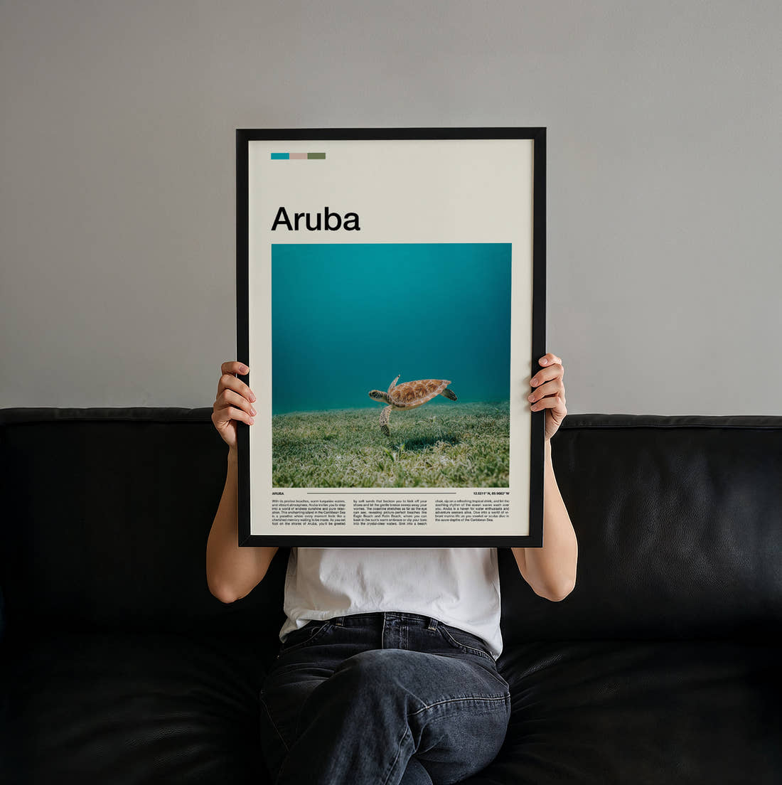 Aruba Sea Turtle Travel Print held up by hand to show the size of the print