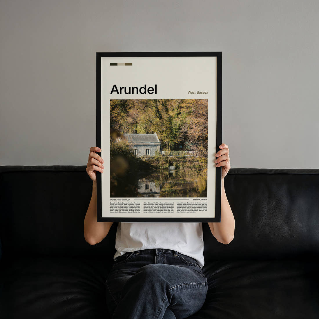 Arundel Riverside Mill Cottage Travel Print held up by hand to show the size of the print