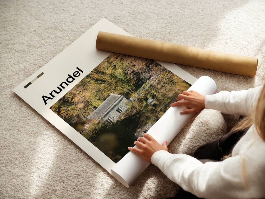 Arundel Riverside Mill Cottage Travel Print being unrolled from its postal tube