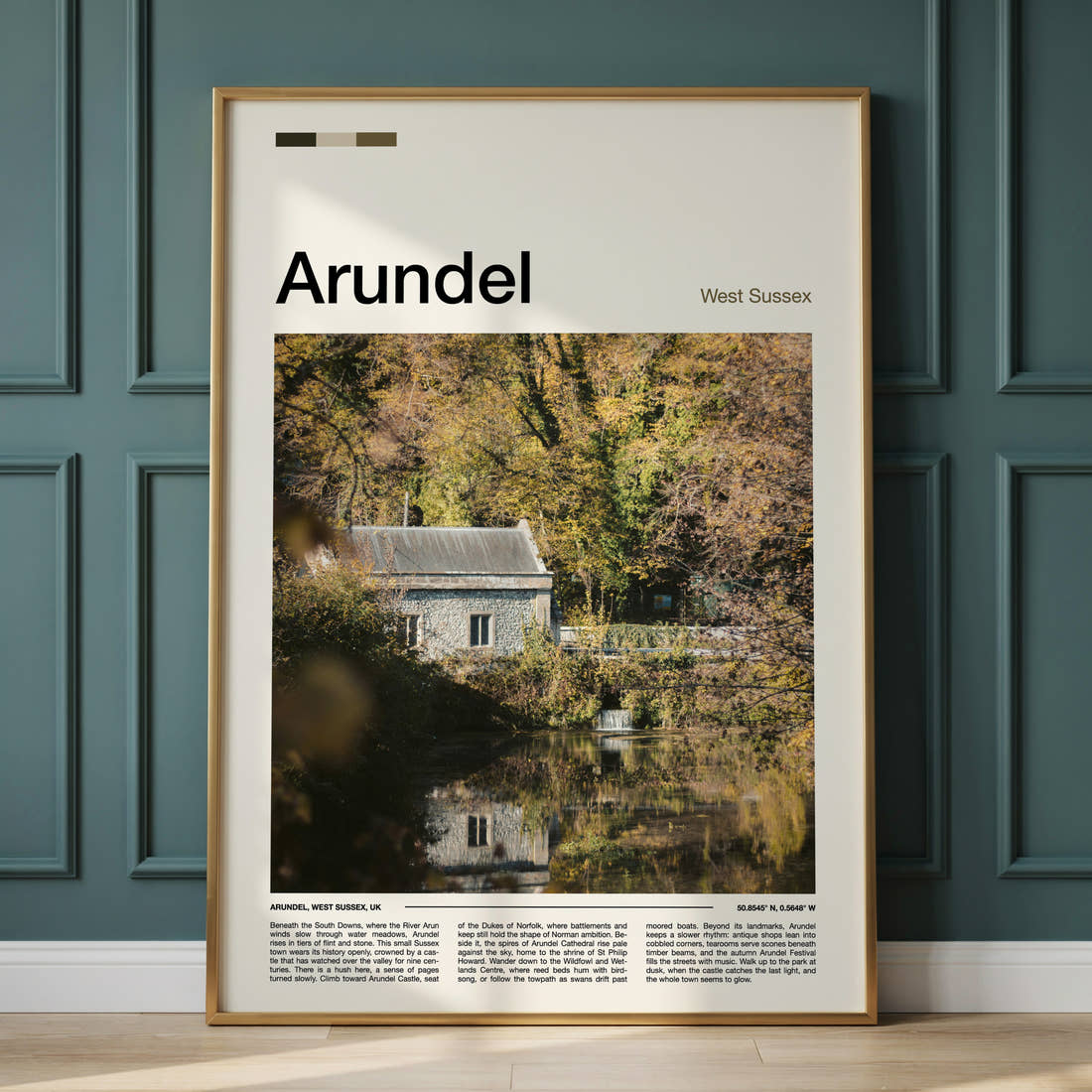 Arundel Riverside Mill Cottage Travel Print framed on the wall of a calm, neutral bedroom