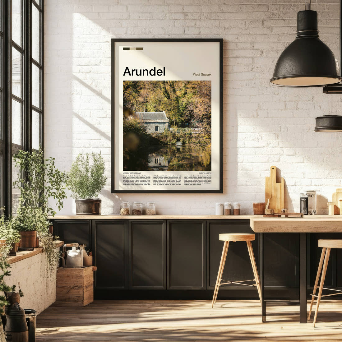 Arundel Riverside Mill Cottage Travel Print framed on the wall of a bright kitchen and dining space