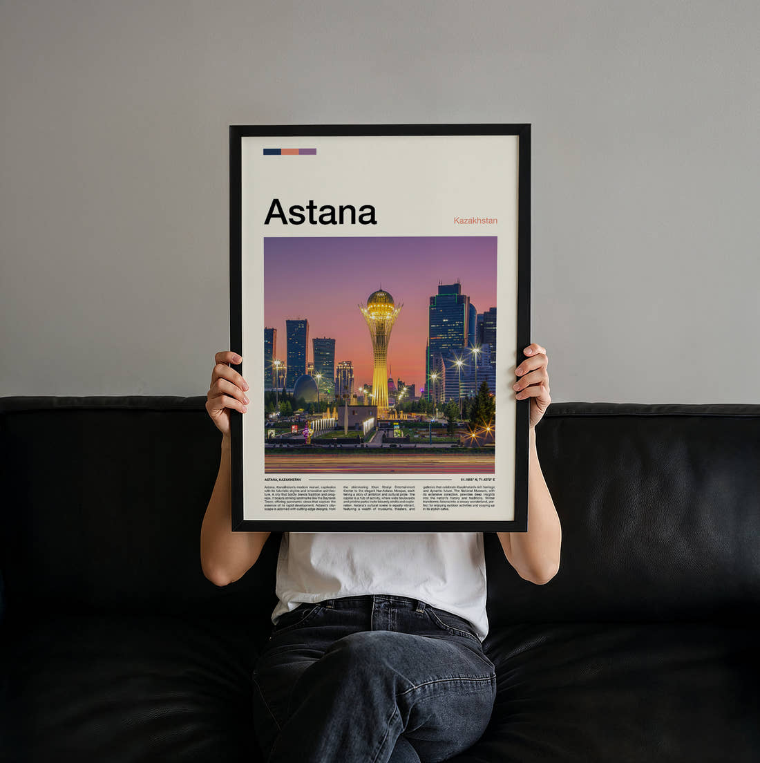 Astana Bayterek Tower Travel Print held up by hand to show the size of the print