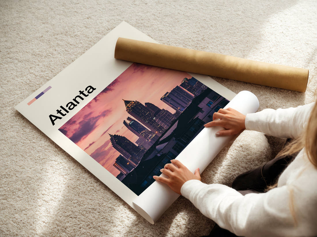 Atlanta Skyline At Dusk Travel Print being unrolled from its postal tube