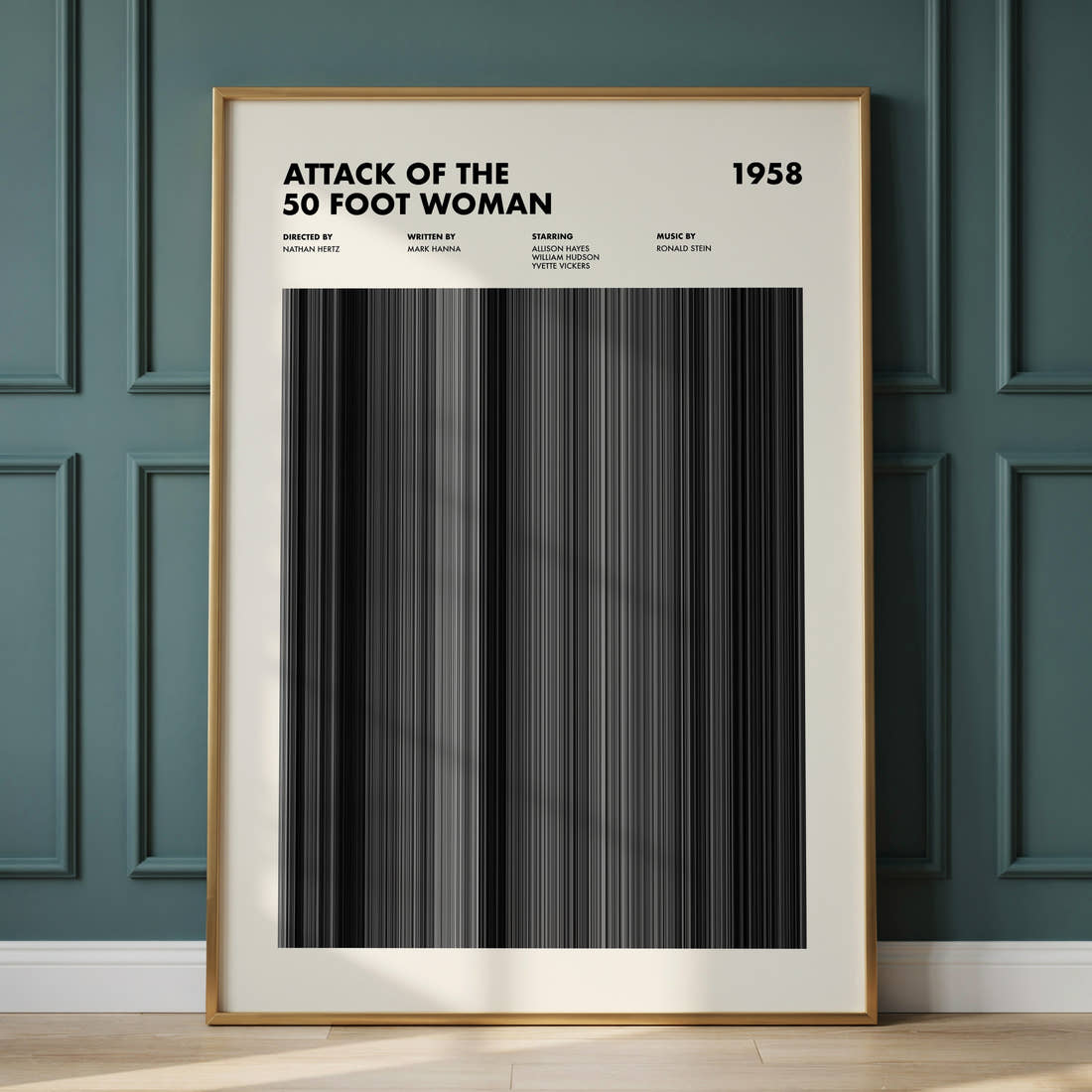 Attack of the 50 Foot Woman Movie Barcode Poster framed and leaning against a panelled wall