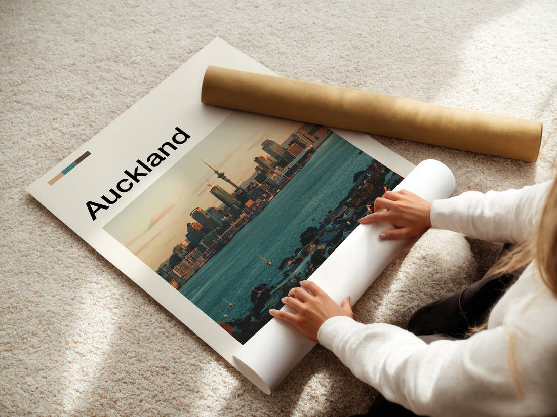 Auckland Sky Tower And Waterfront Travel Print being unrolled from its postal tube