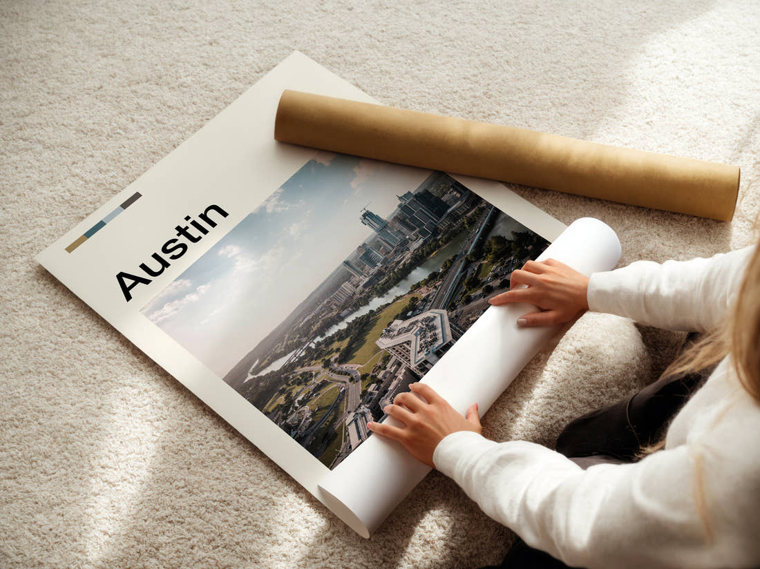 Austin Aerial City View Travel Print being unrolled from its postal tube