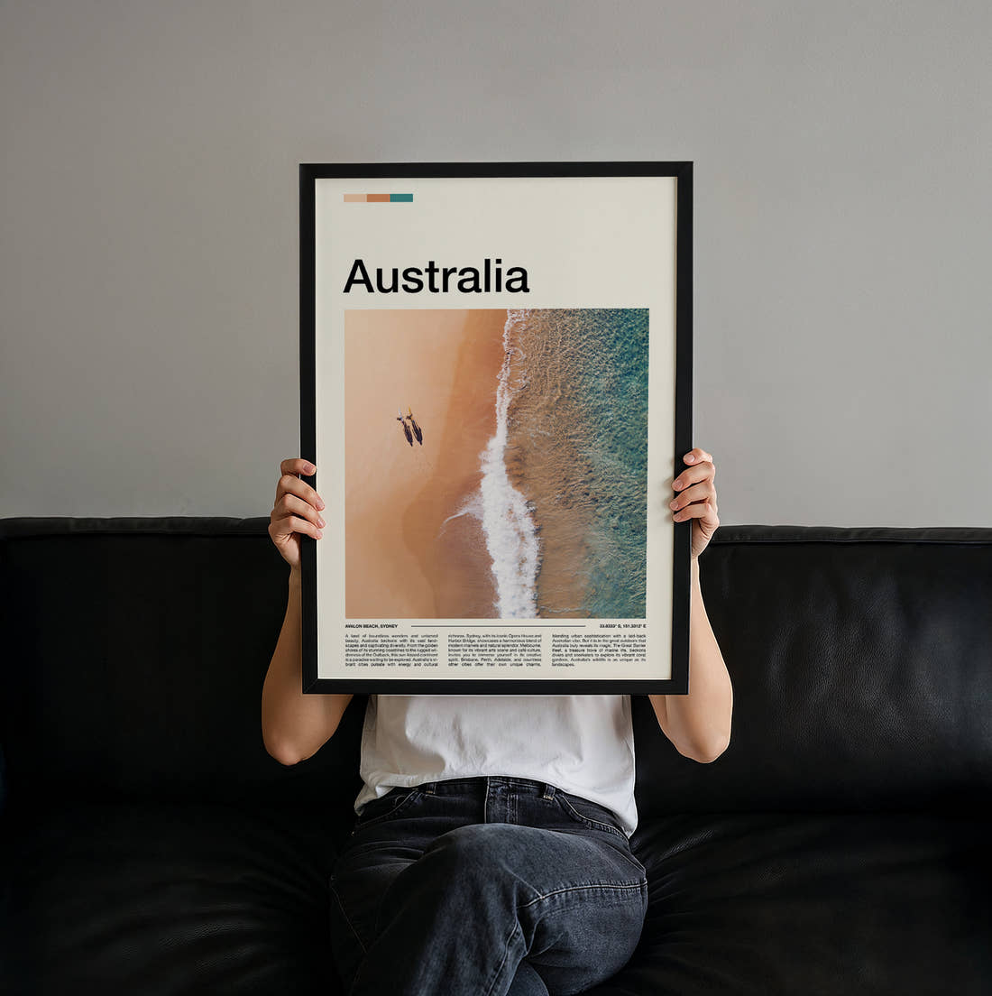 Australia Shoreline From Above Travel Print held up by hand to show the size of the print