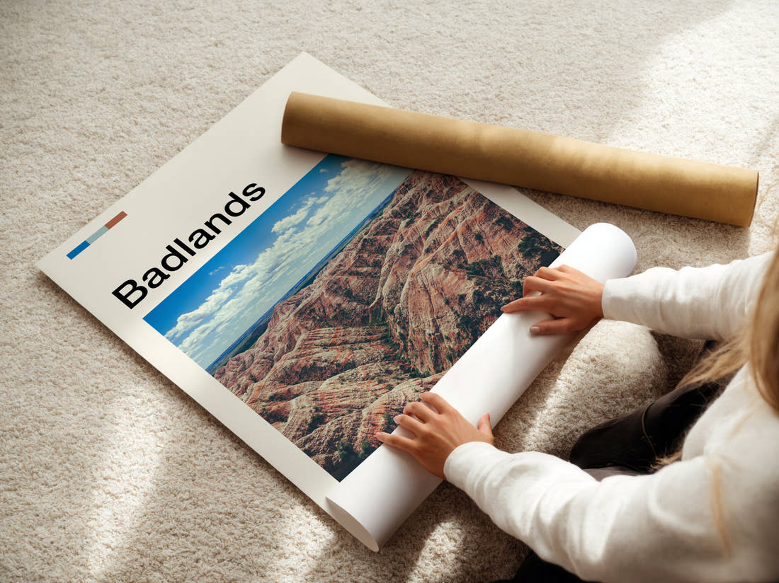 Badlands Eroded Rock Formations Travel Print being unrolled from its postal tube