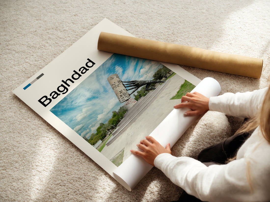 Baghdad Saving Iraqi Culture Monument Travel Print being unrolled from its postal tube