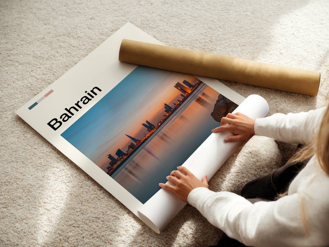 Bahrain Skyline At Dusk Travel Print being unrolled from its postal tube