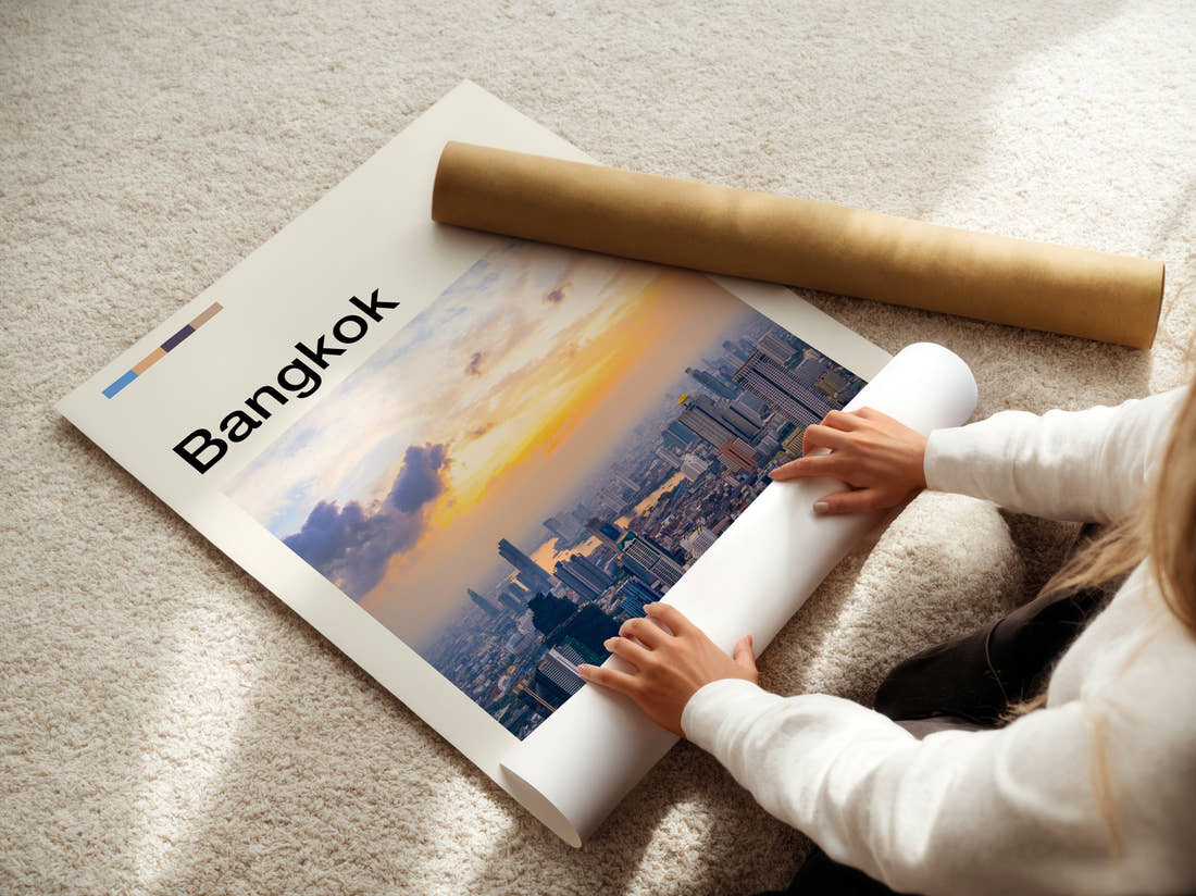 Bangkok Skyline At Sunset Travel Print being unrolled from its postal tube